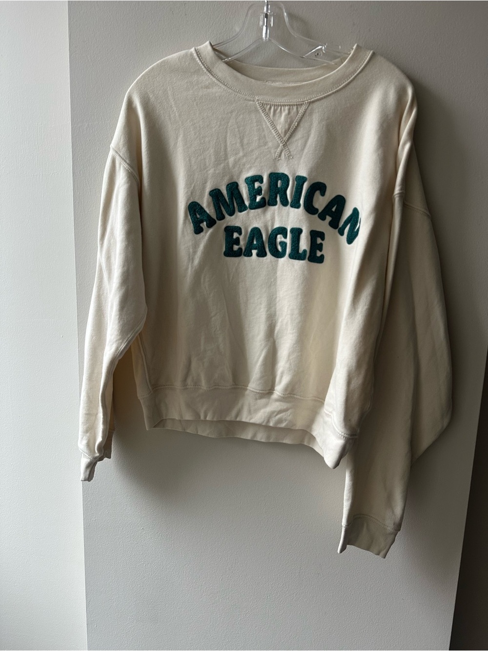 American Eagle Outfitters Cream Pullover Sweatshirt with Teal Logo